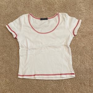 Brandy Melville white baby tee with red stitching